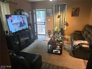 Living area featuring wood finished floors