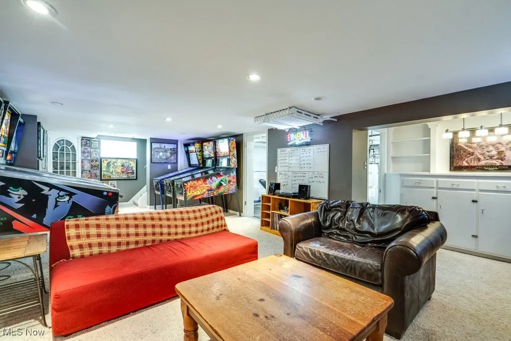 Living room featuring light carpet and recessed lighting