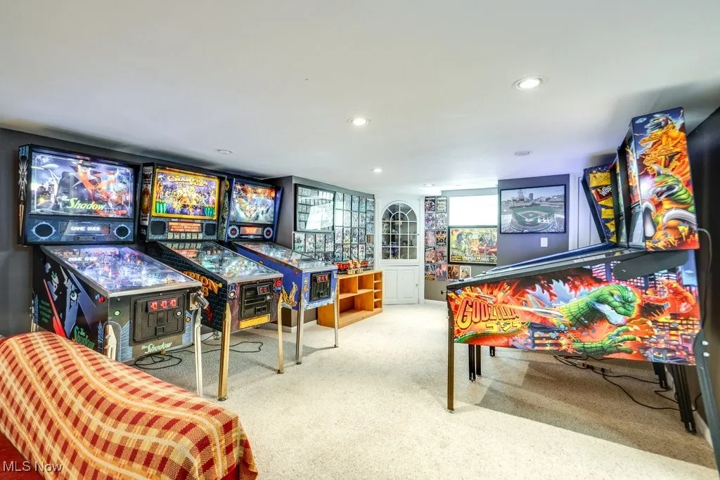 Recreation room with recessed lighting and carpet flooring
