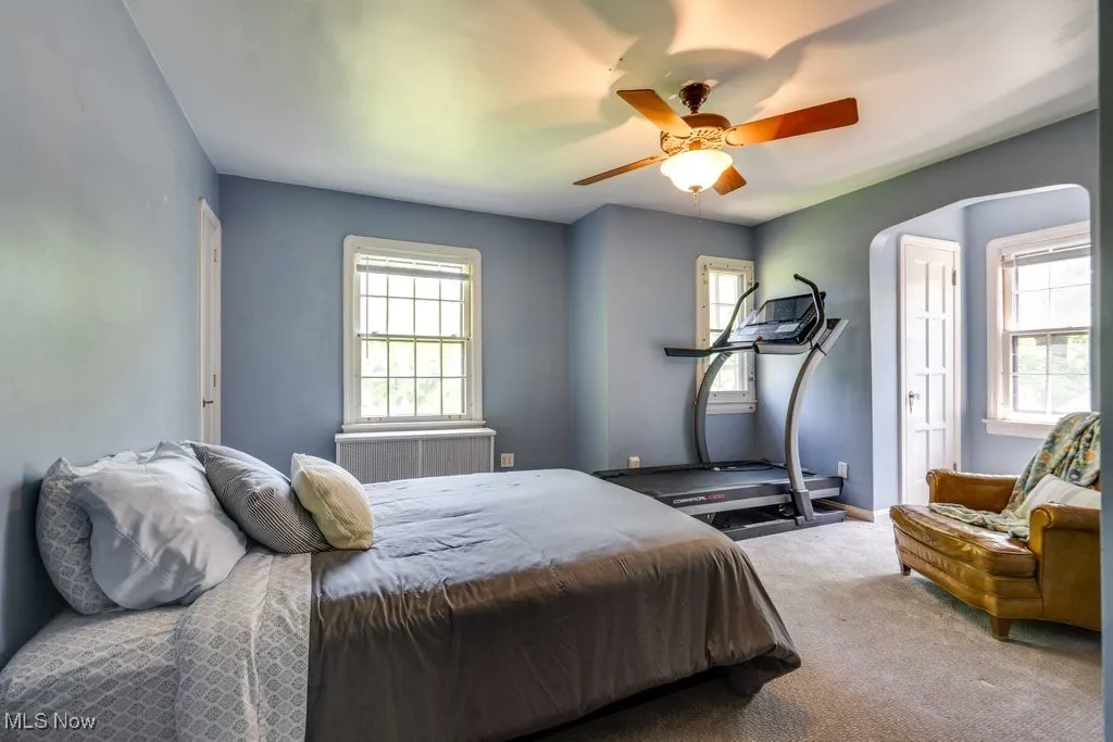 Bedroom featuring carpet flooring and a ceiling fan