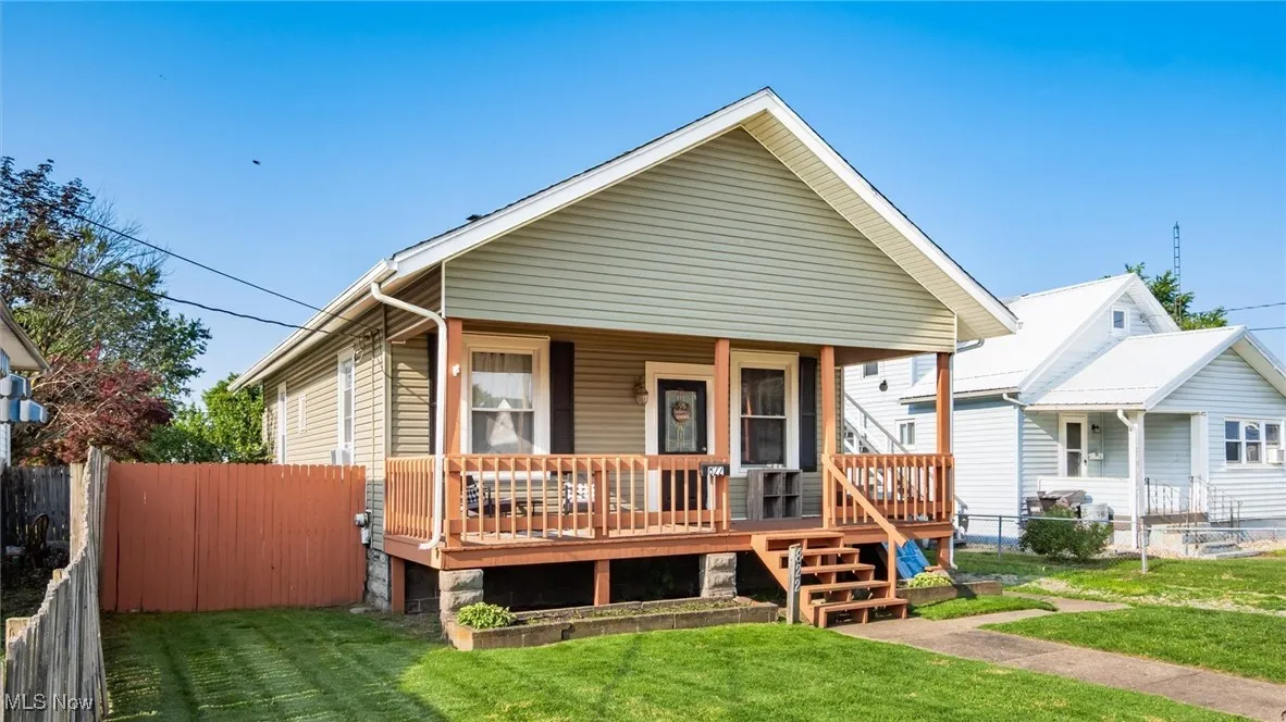 View of front of property with a porch