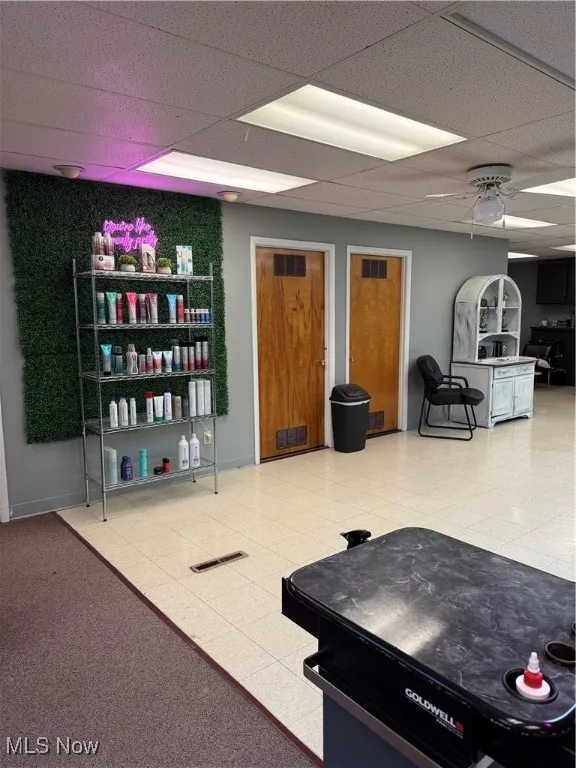 Building lobby with a paneled ceiling