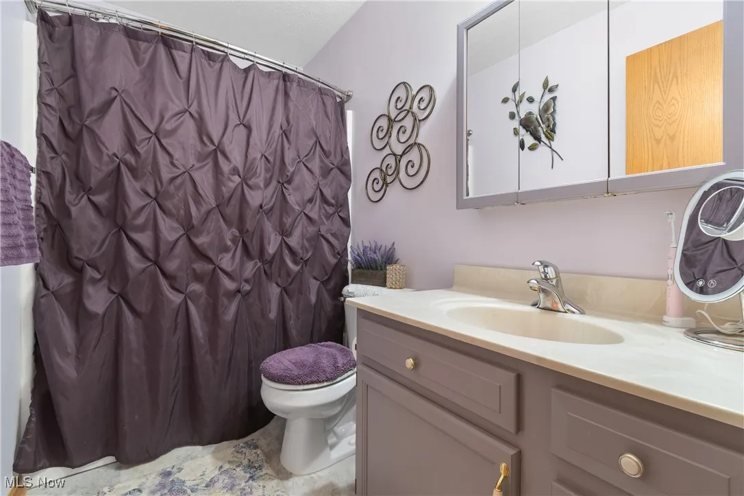 Main bath with tub/shower combination.