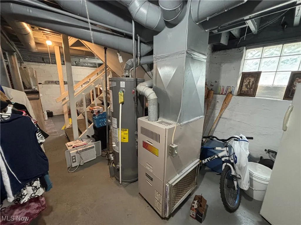 Utility room with gas water heater