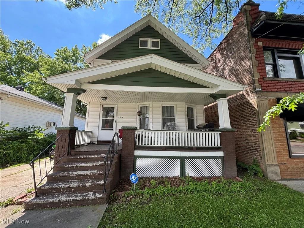 Shotgun-style home with a porch