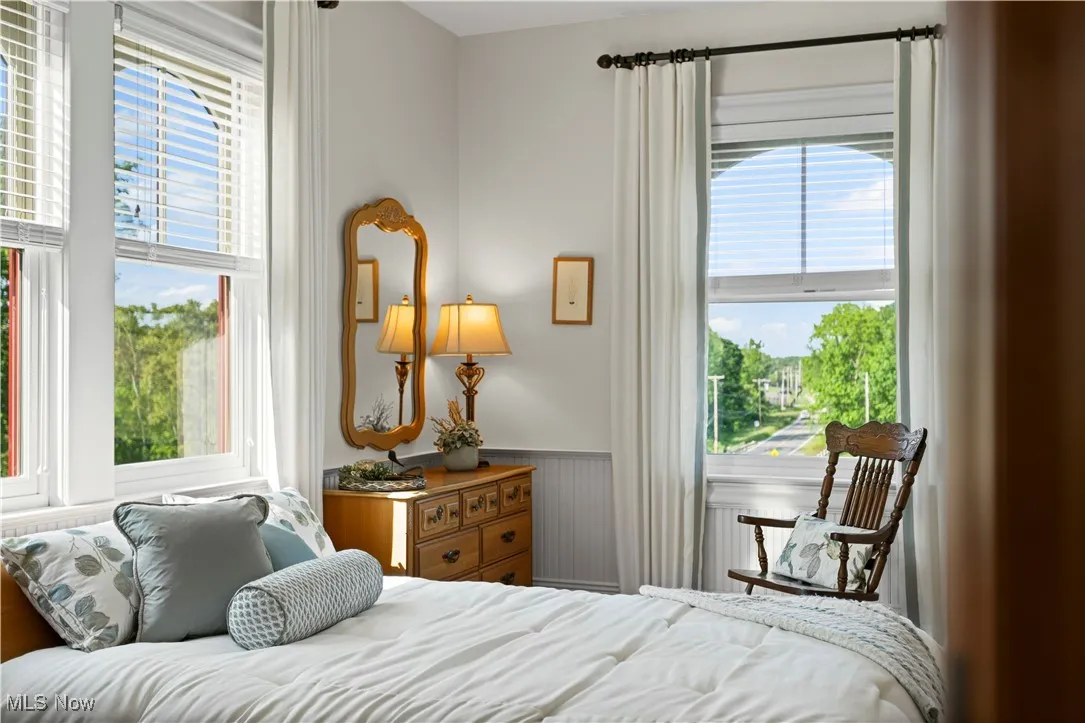 Bedroom with wainscoting