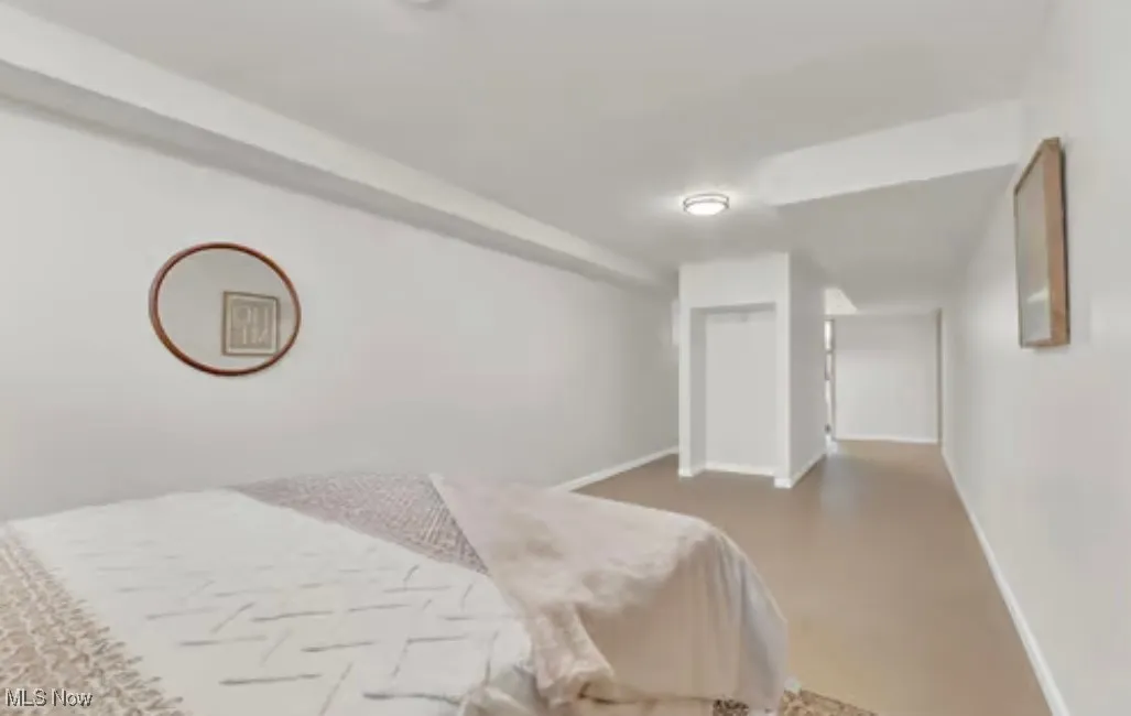 Bedroom with baseboards