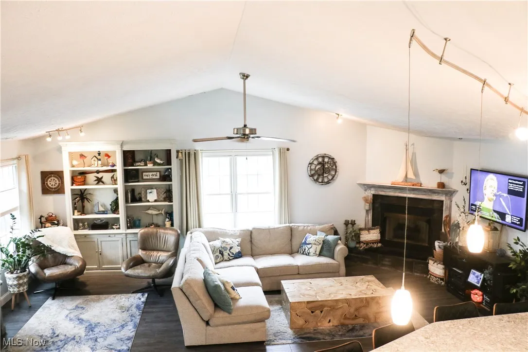 Spacious vaulted Great Room with sitting area to the living room area to the gas fireplace!