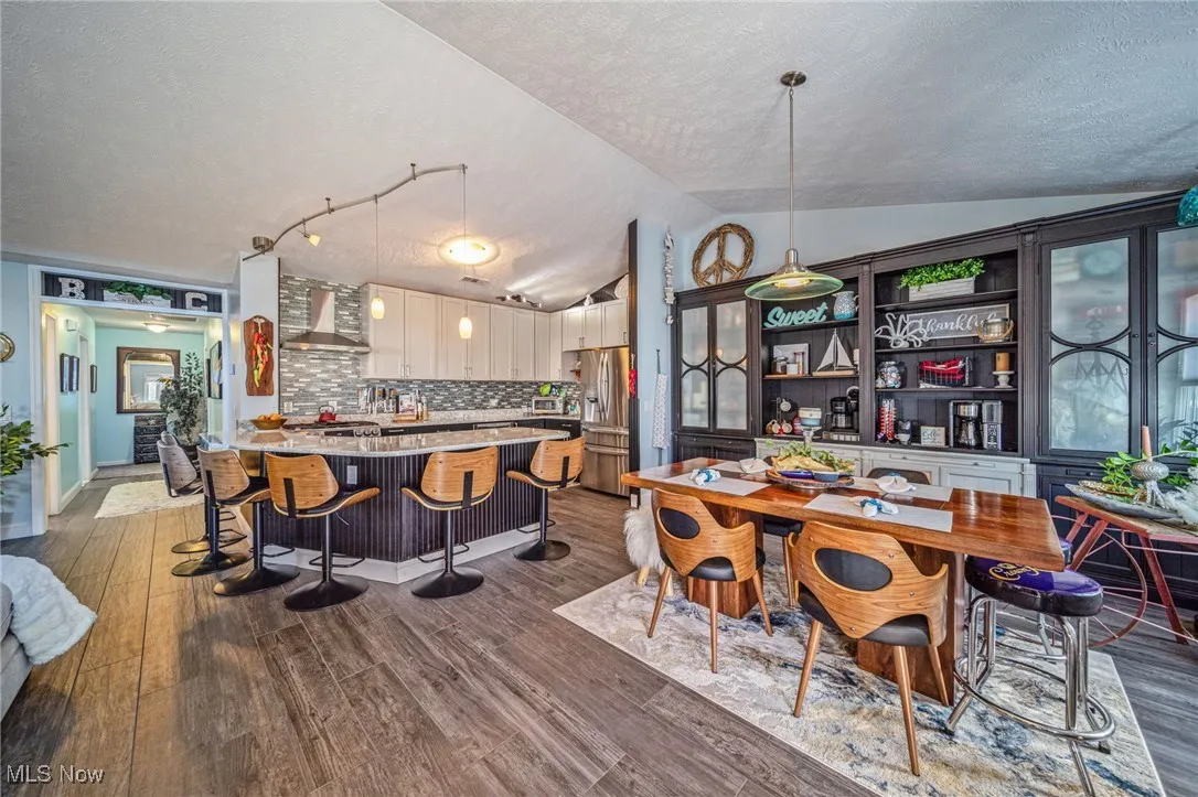 Dining room open into the gorgeous custom kitchen!