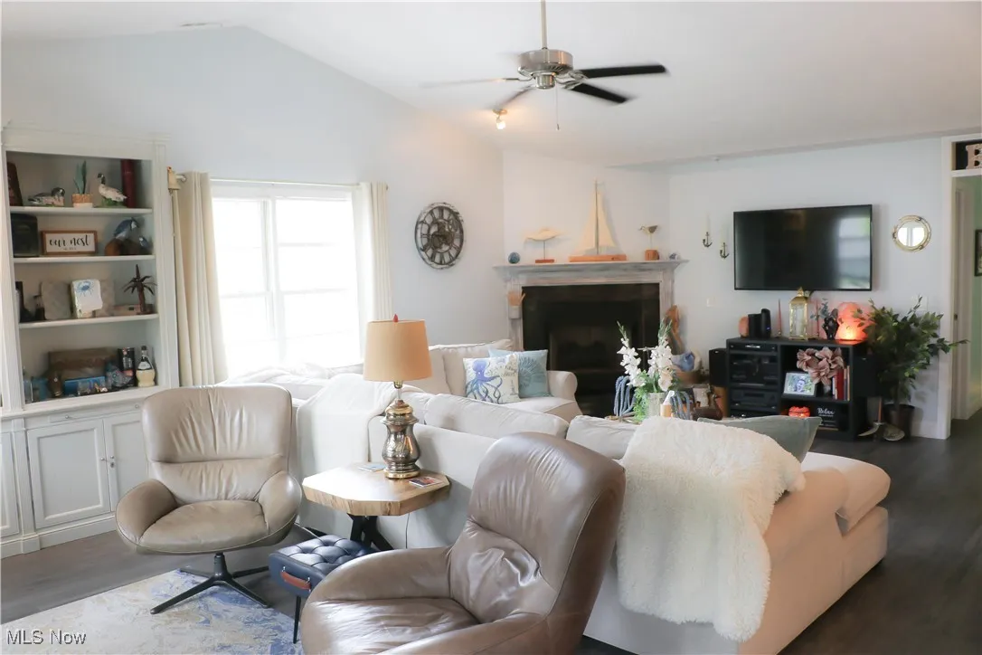 Great room view from the sitting area towards the cozy corner fireplace!