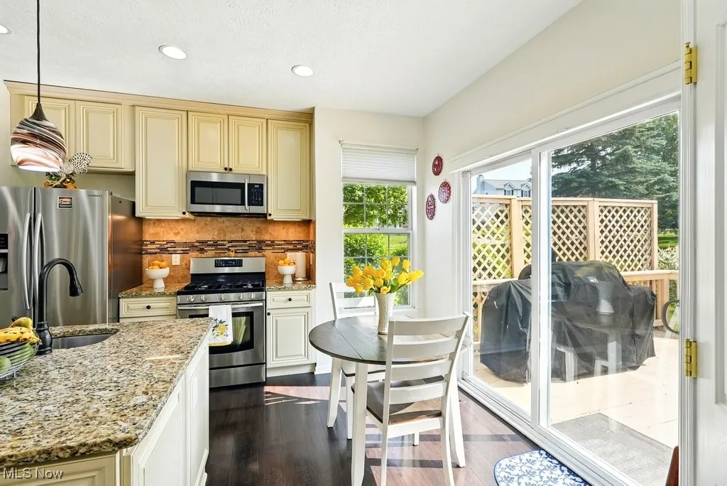 Kitchen with Granite Countertops, Large island, Updated Appliances, and 2 Pantries