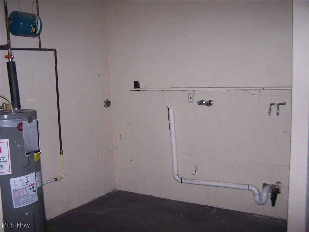 Laundry hook-ups in utility room in lower level.