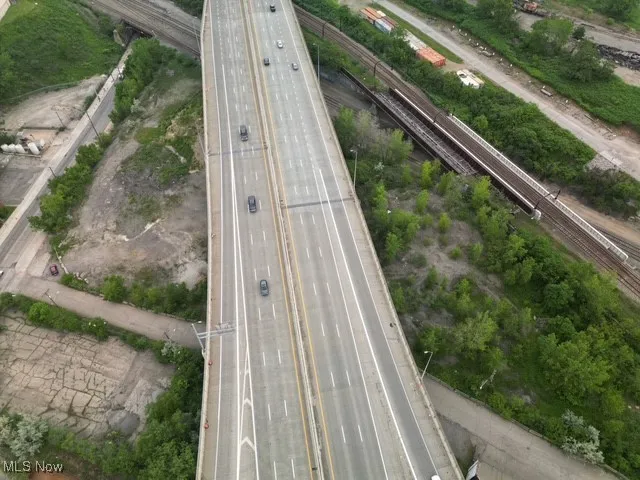 Aerial overview of property's location featuring a major roadway