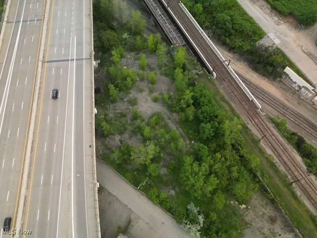 Aerial overview of property's location with a highway