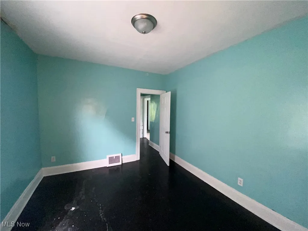 Empty room with baseboards