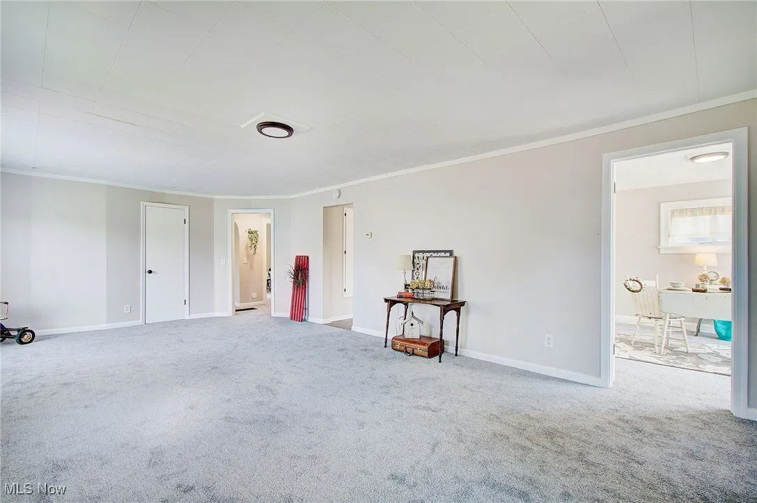 Living room with new tootsie pleasing carpet.