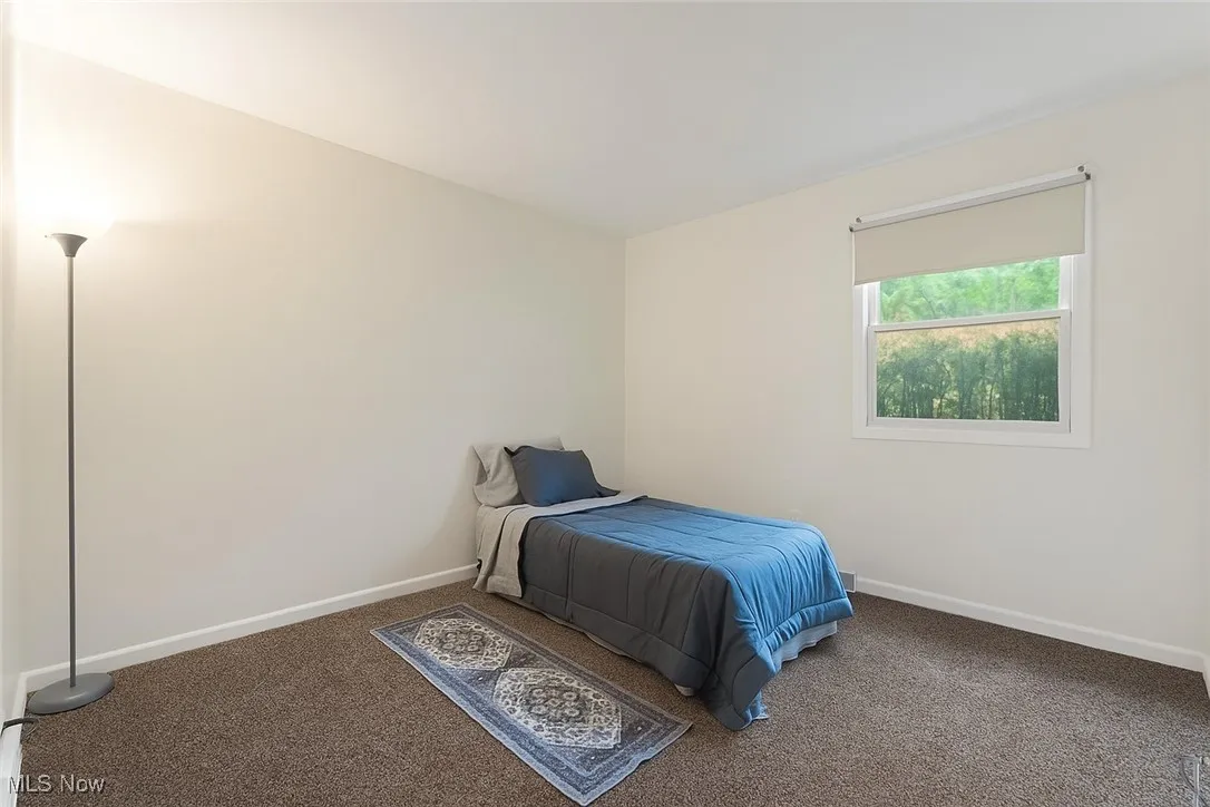 Bedroom featuring carpet