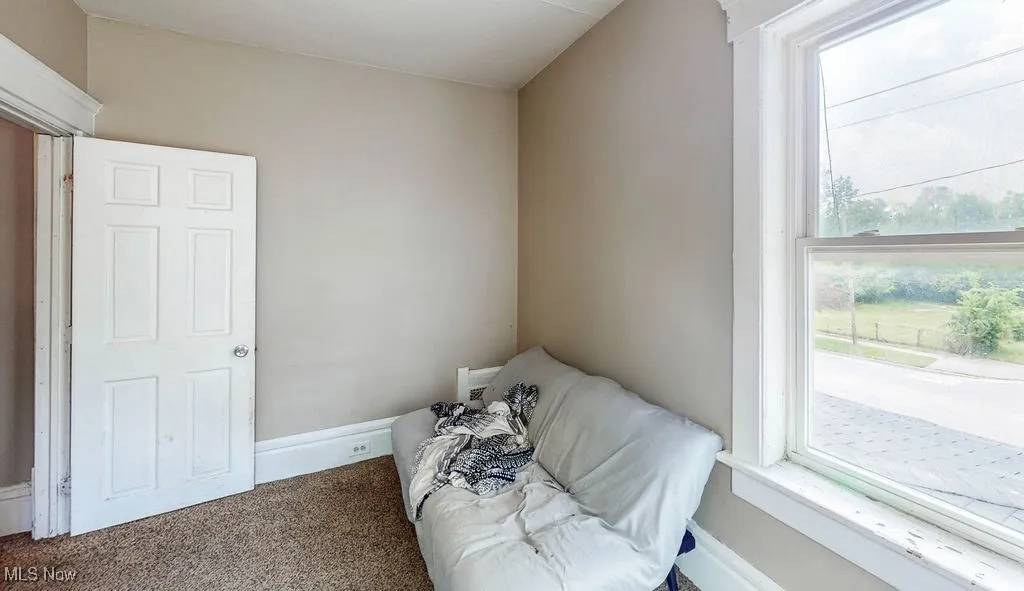 Bedroom featuring carpet