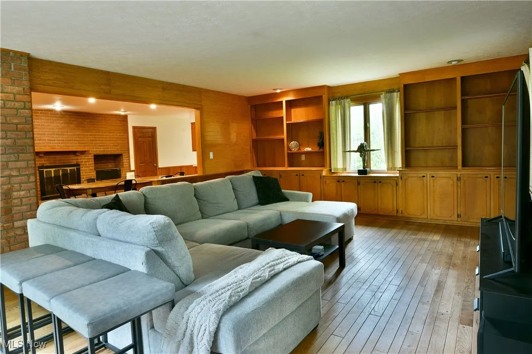 Living area with light wood finished floors