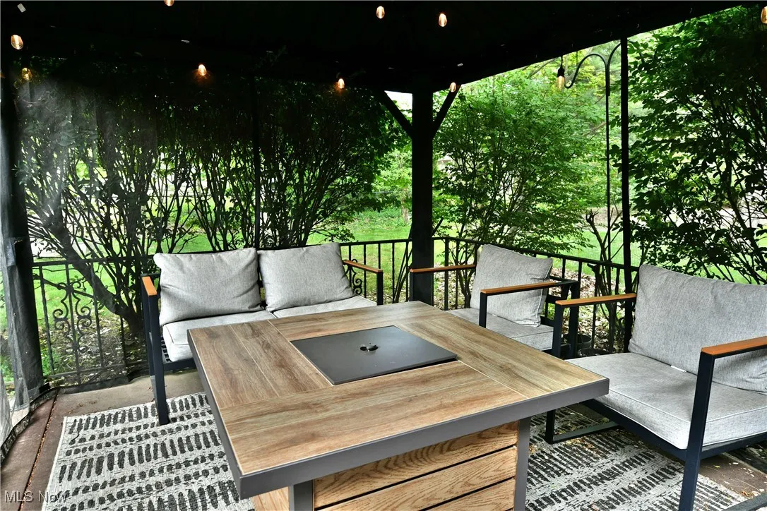 Wooden terrace with an outdoor living space