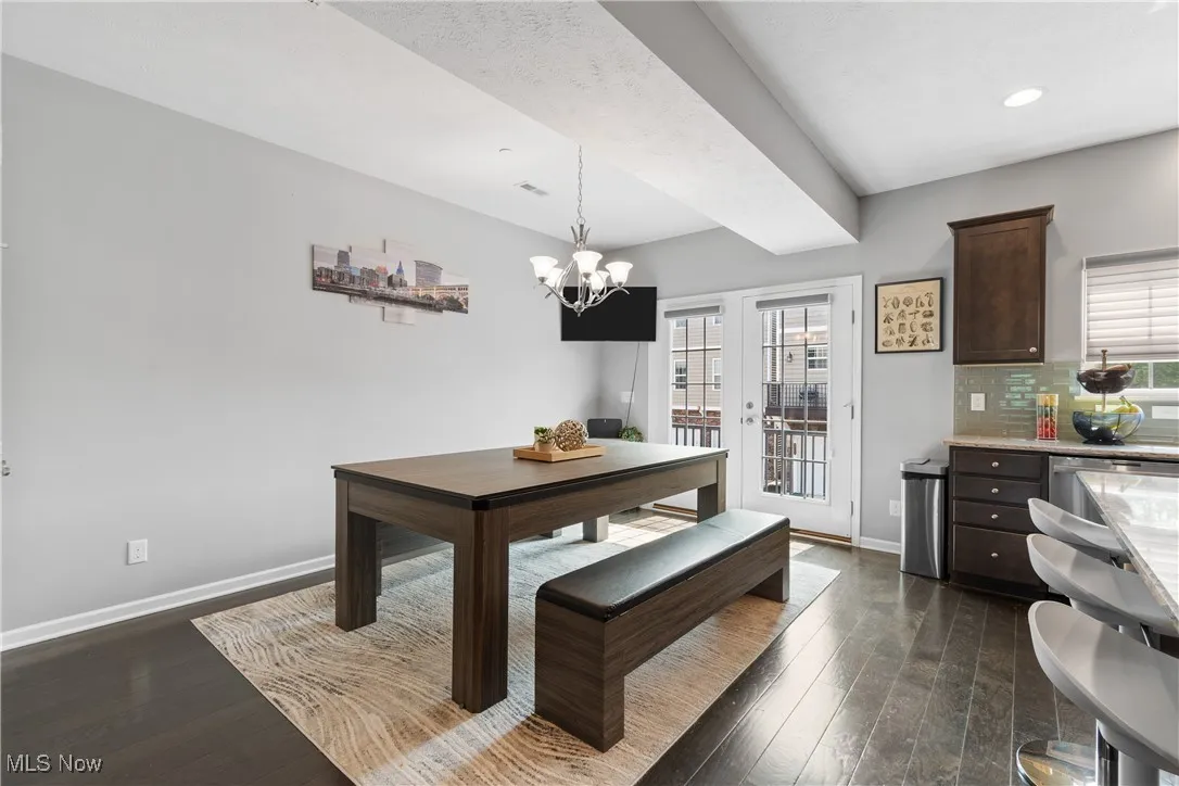 Dining room with double doors leading to your balcony for sunshine and downtown people-watching!