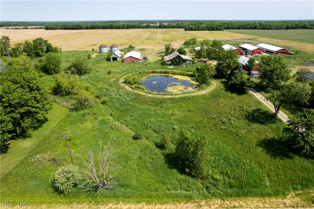 Overview of rural landscape featuring a nearby body of water
