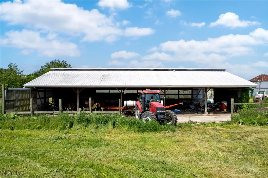 View of pole building featuring a carport