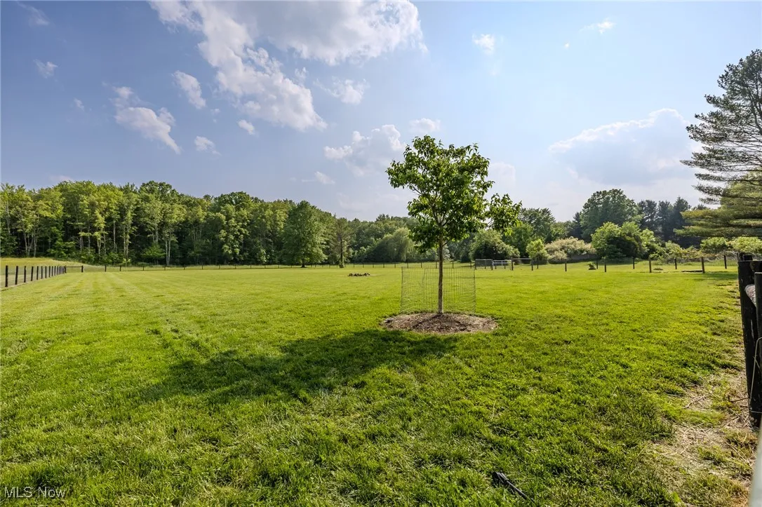 View of yard with a view of countryside