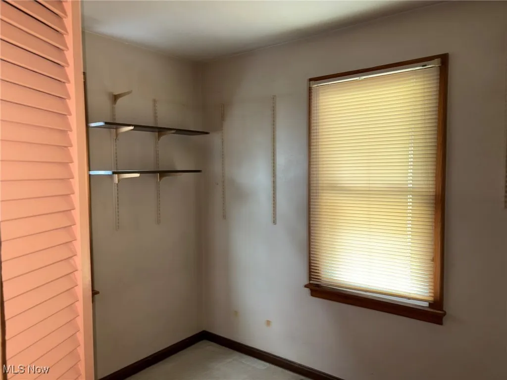 Spare room with baseboards