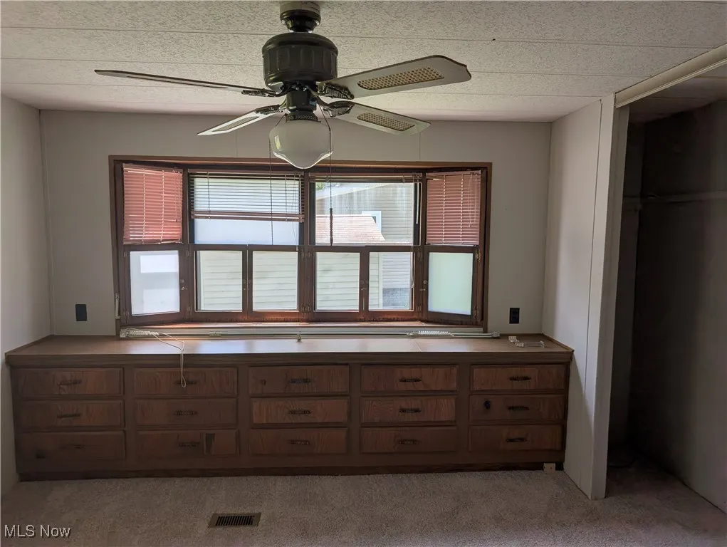 Unfurnished bedroom featuring carpet flooring