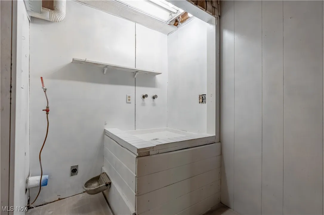 Washroom with hookup for an electric dryer