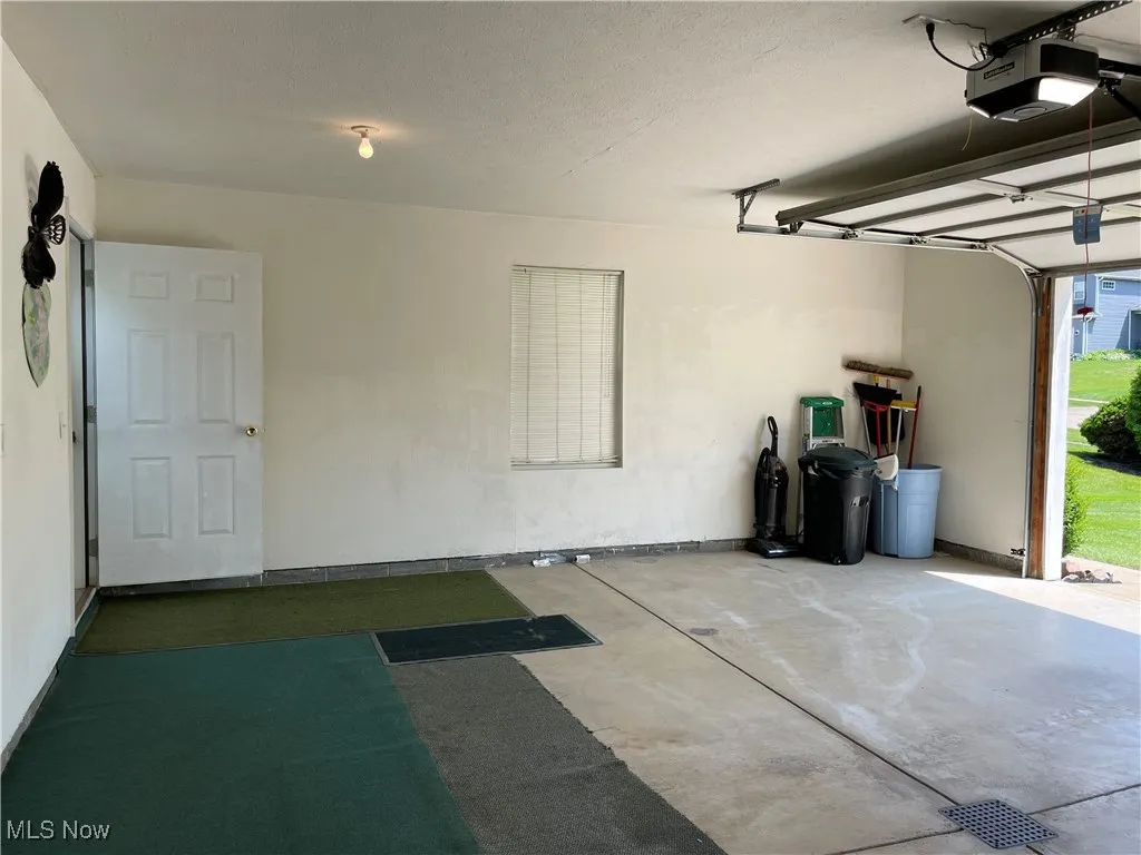 Clean and Partly Carpeted Garage