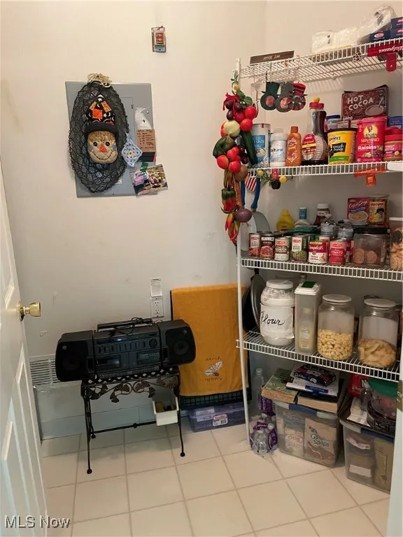 This walk-in pantry is perfect for all.