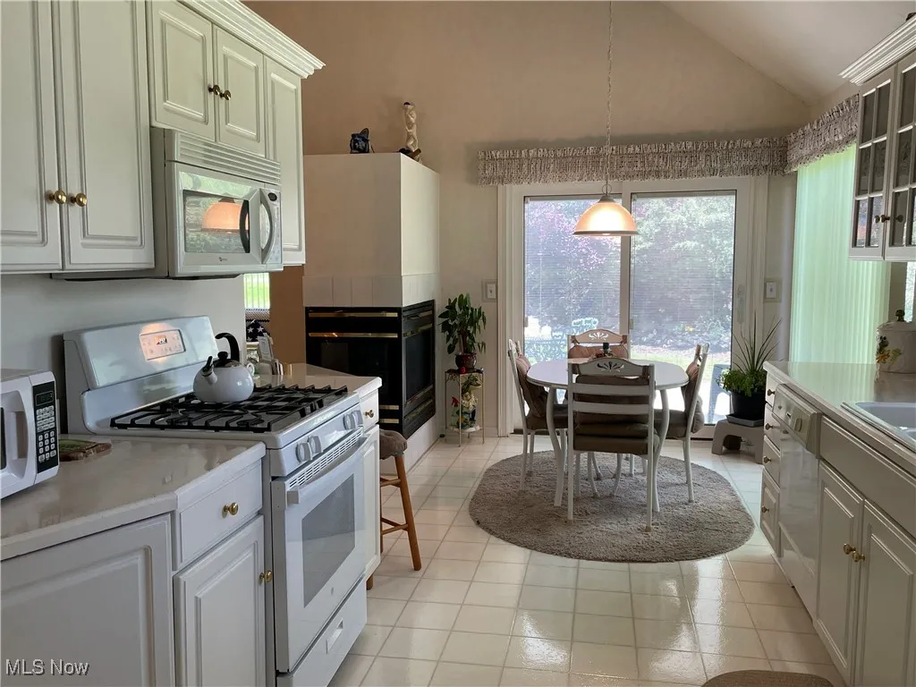 Spacious Kitchen light & bright, plenty of cabinets, all newer appliances, pantry and much more.