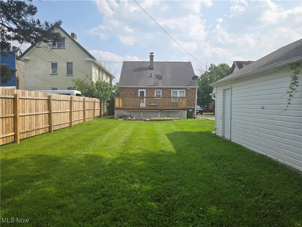 View of yard featuring a deck