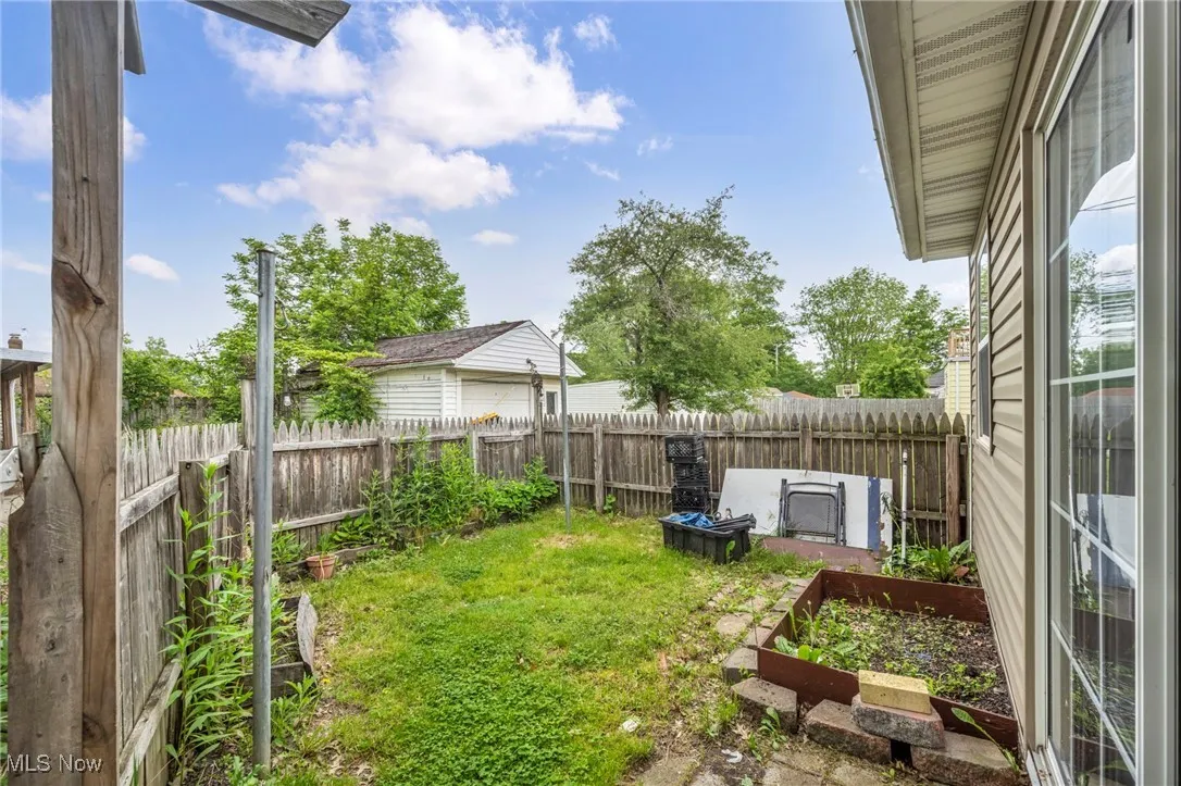 View of yard featuring a garden