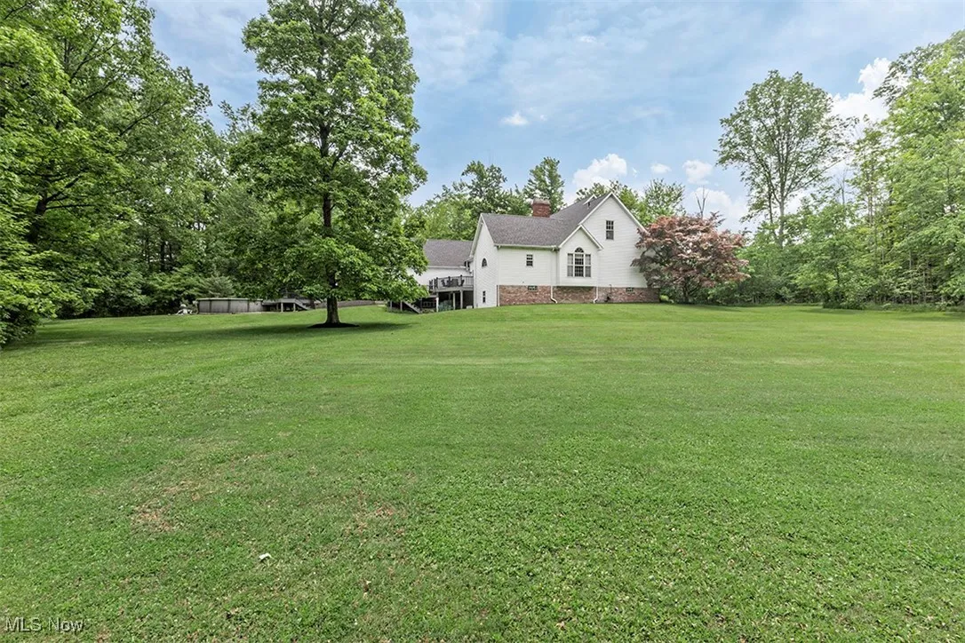 Long view of your home nestled on 3+ acres.