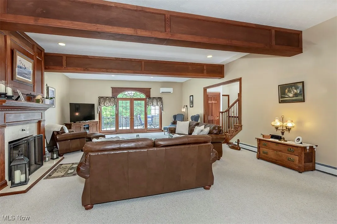 Gorgeous beamed ceiling warms the 30 foot expanse of this Great Room.