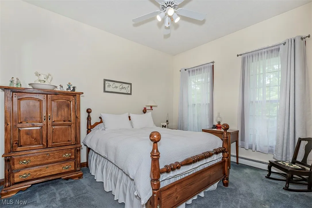 Third Bedroom. Mirrored closet doors, ceiling fan.