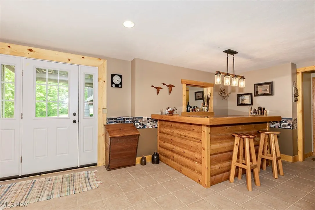 Basement Bar. Door to the left walks out to the backyard ~