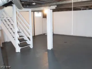 Unfinished below grade area with stairway