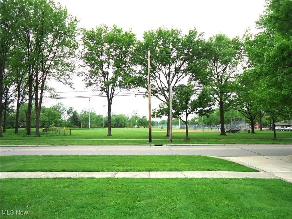 View of home's community featuring a yard