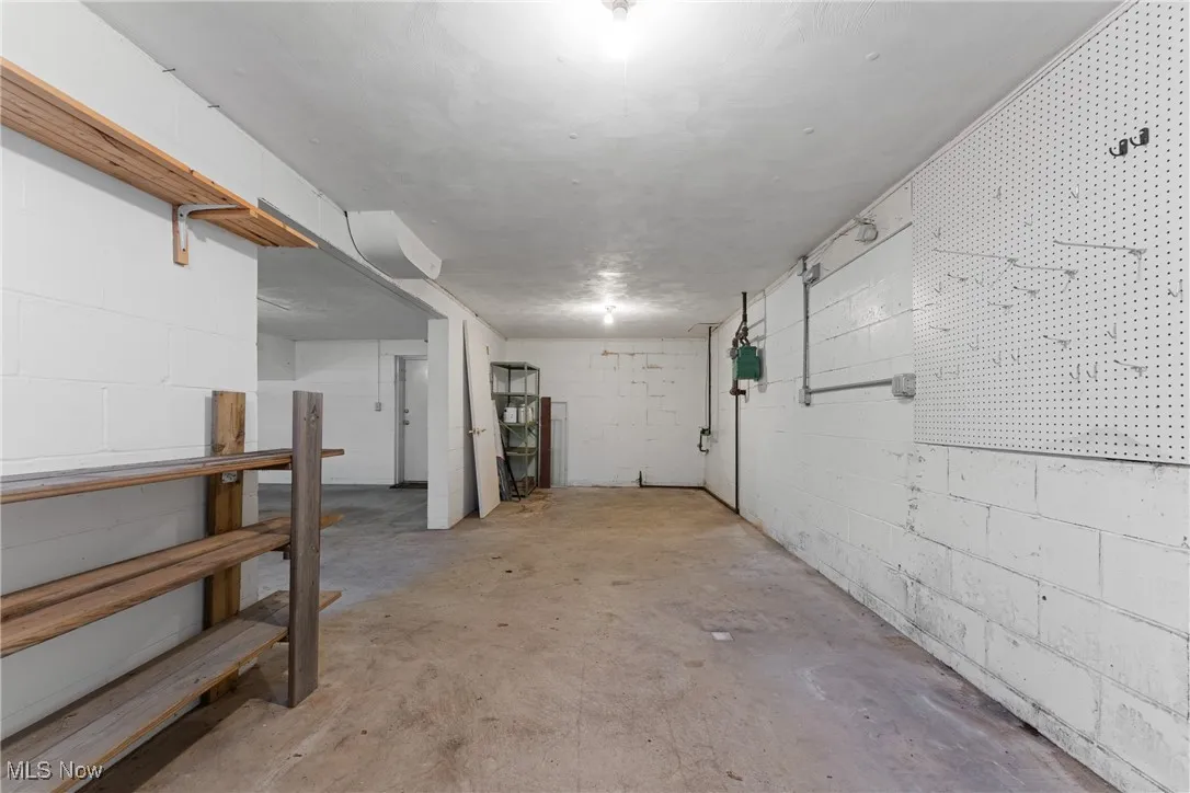 Basement featuring concrete block​​‌​​​​‌​​‌‌​‌‌​​​‌‌​‌​‌​‌​​​‌​​ wall