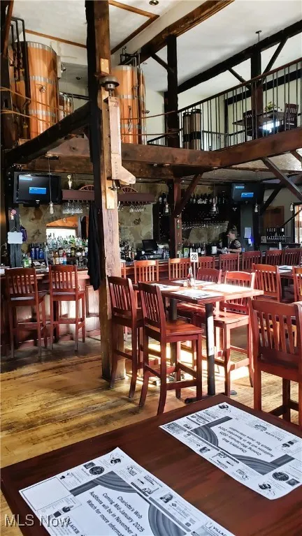 Dining space featuring wood finished floors