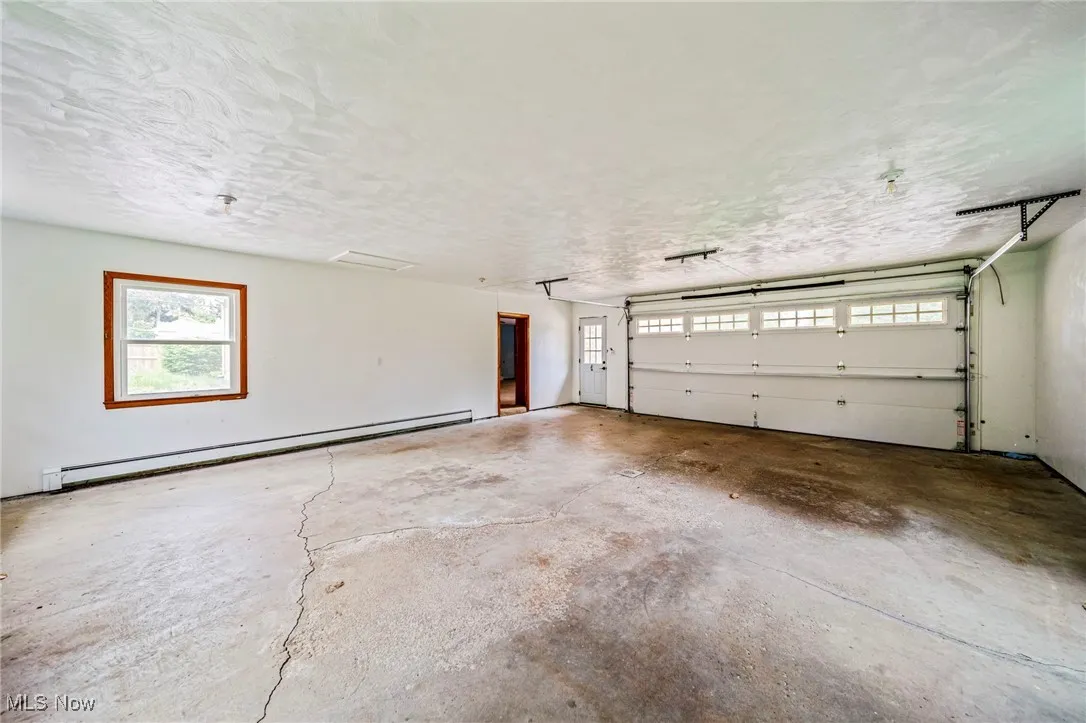Garage with a baseboard radiator