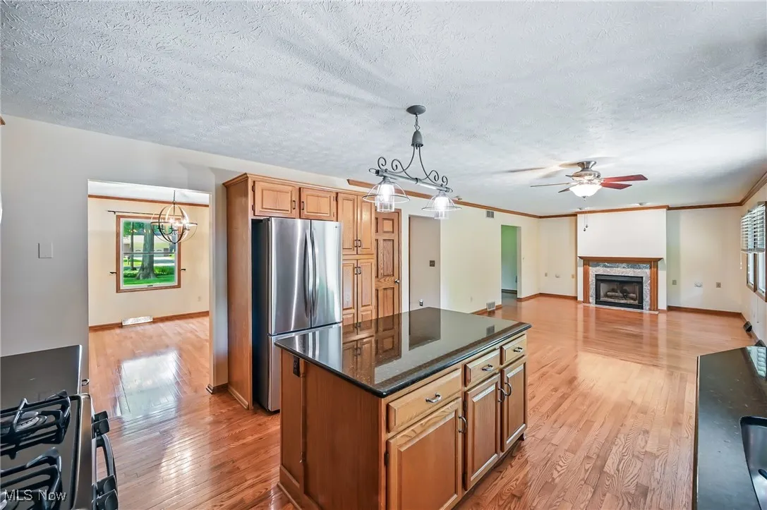 Kitchen featuring appliances with stainless steel finishes, granite counter tops