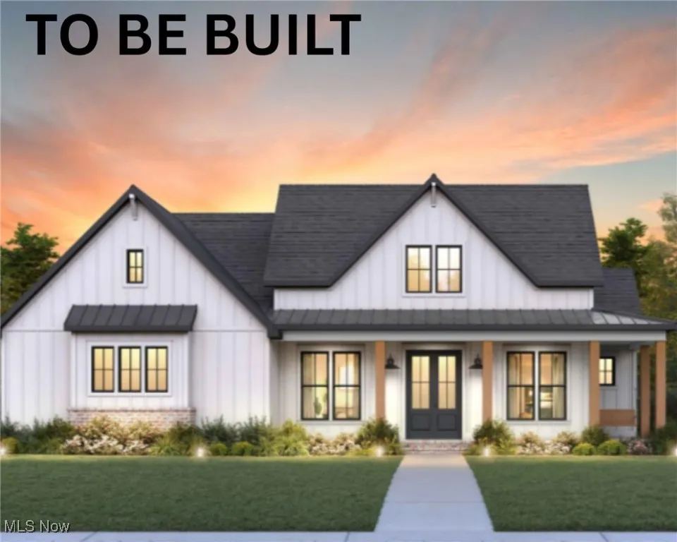 To be built-Modern farmhouse style home with a standing seam roof, french doors, and a metal roof