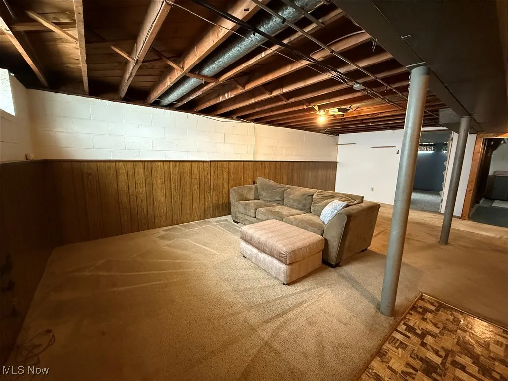 Finished below grade area featuring carpet flooring