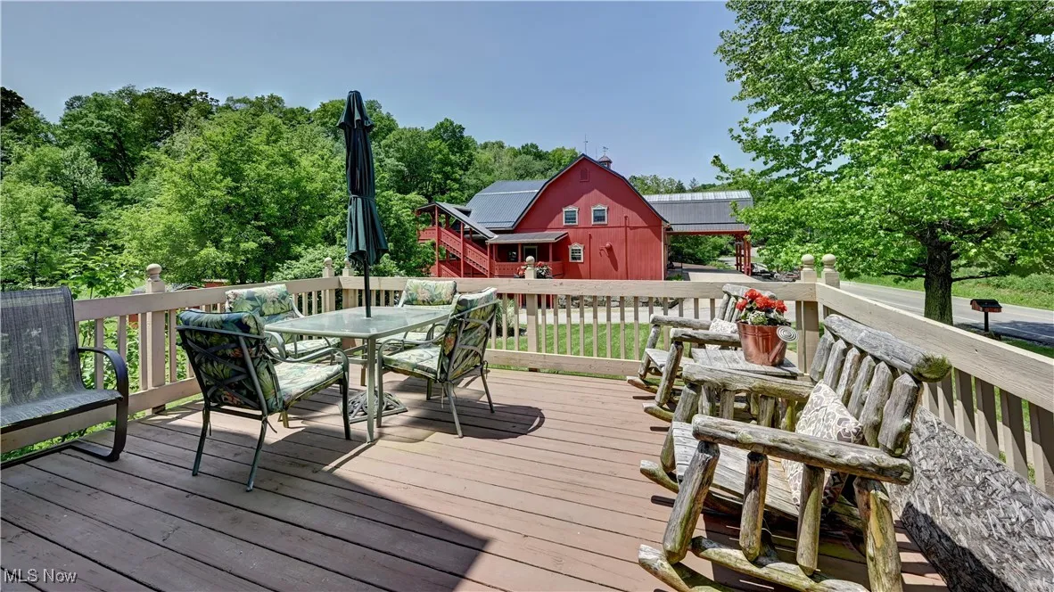 Wooden terrace with outdoor dining space