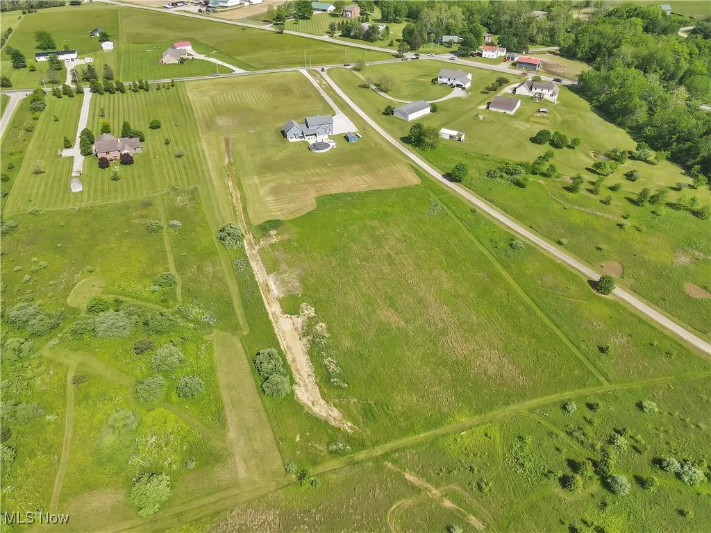 Aerial overview of property's location with rural landscape